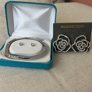 Silver and rhinestone bracelet and studs and statement earrings